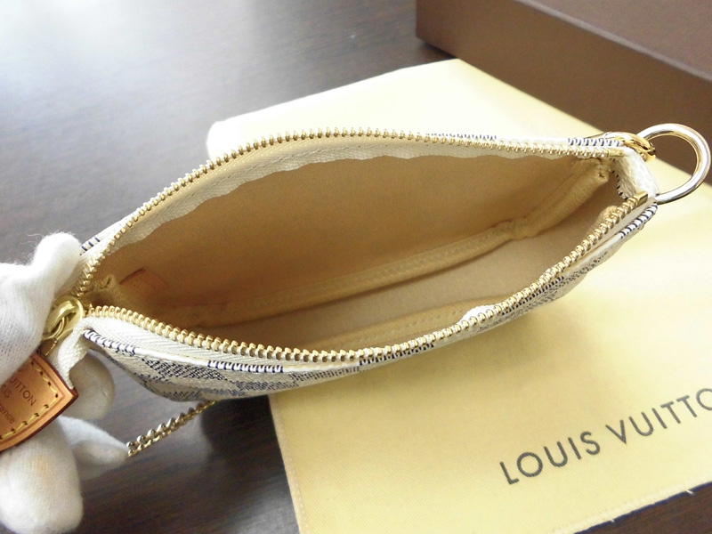 N58010 LV MINI POCHETTE ACCESSORIES系列白色手拎包LV单肩包- 米兰站