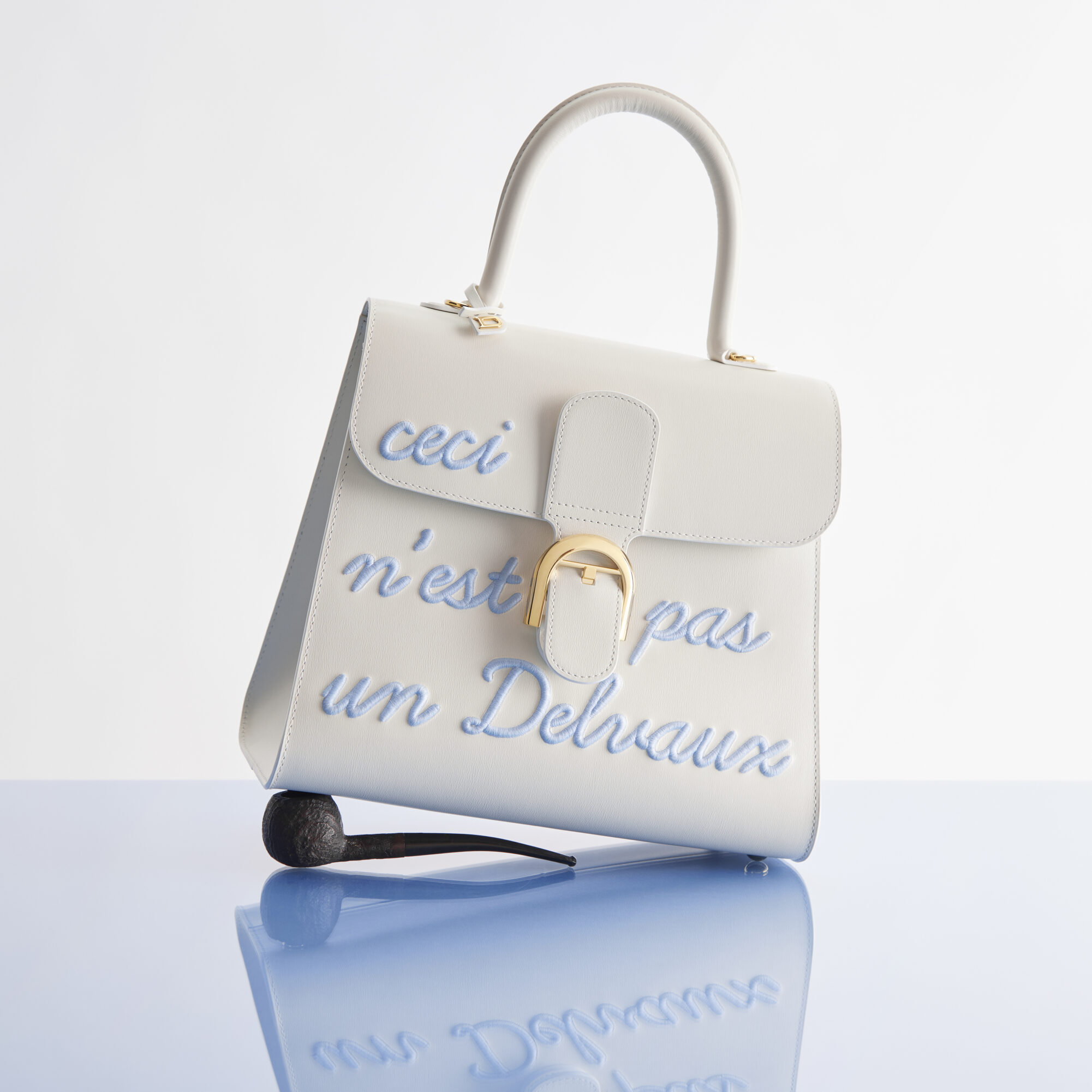 Delvaux 限量发售马格利特125周年系列包袋：René Magritte 超现实主义画作